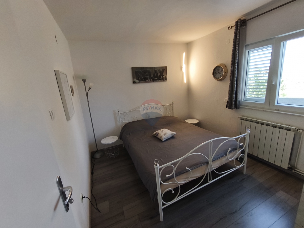 Appartamento con due camere da letto con piscina e garage al piano terra - posizione tranquilla, Vadalj