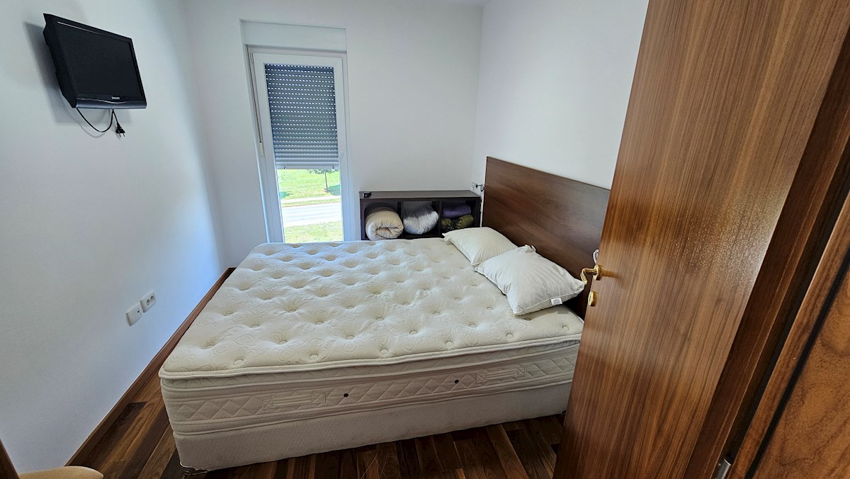 Appartamento con terrazza sul tetto e vista mare