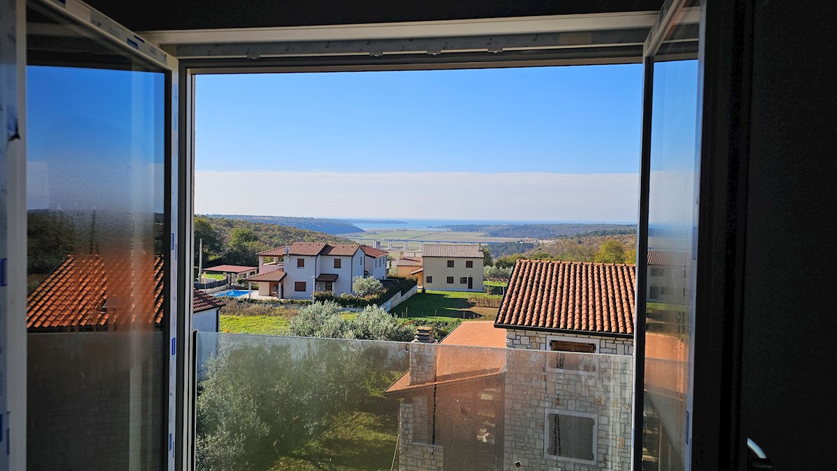 Casa bifamiliare in posizione tranquilla con splendida vista mare e piscina