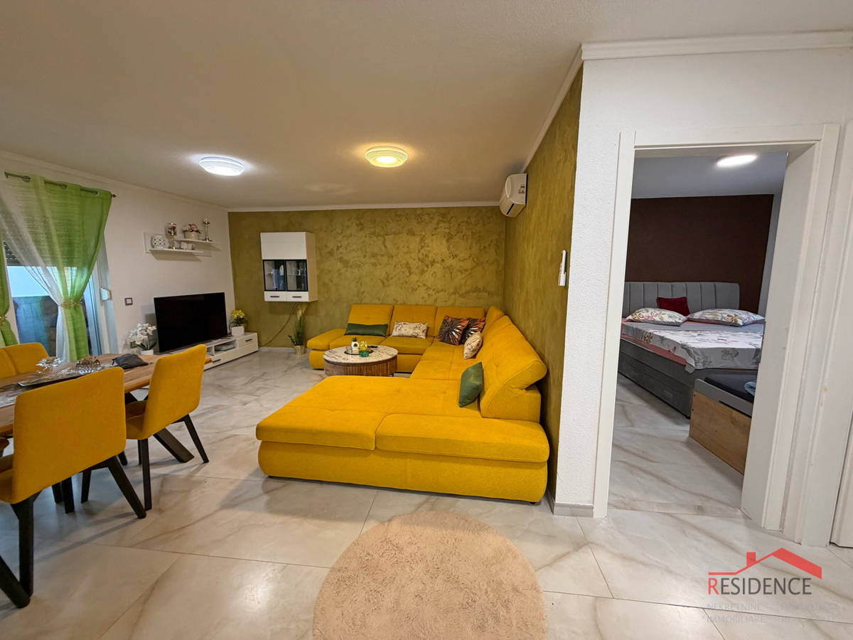 Appartamento trilocale a Medolino al piano terra