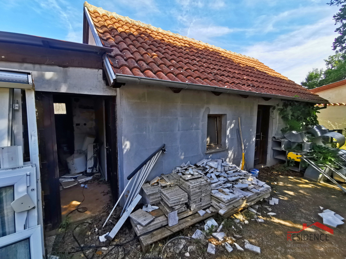 Medolino, terreno agricolo con casa legalizzata