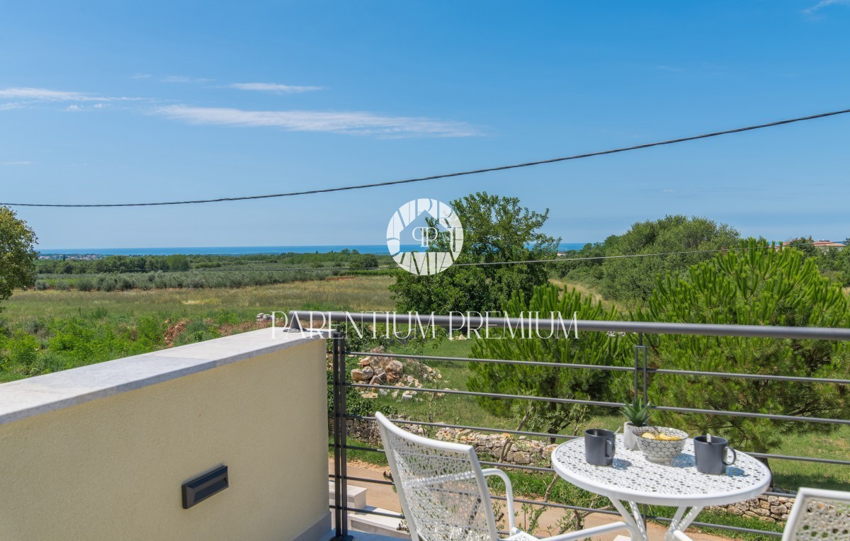 Casa bifamiliare con piscina e vista panoramica sul mare