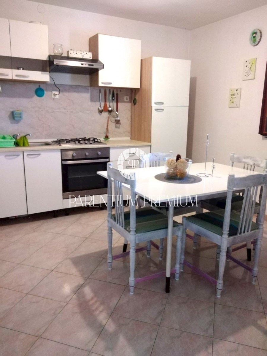 Casa con 2 unità abitative in posizione tranquilla