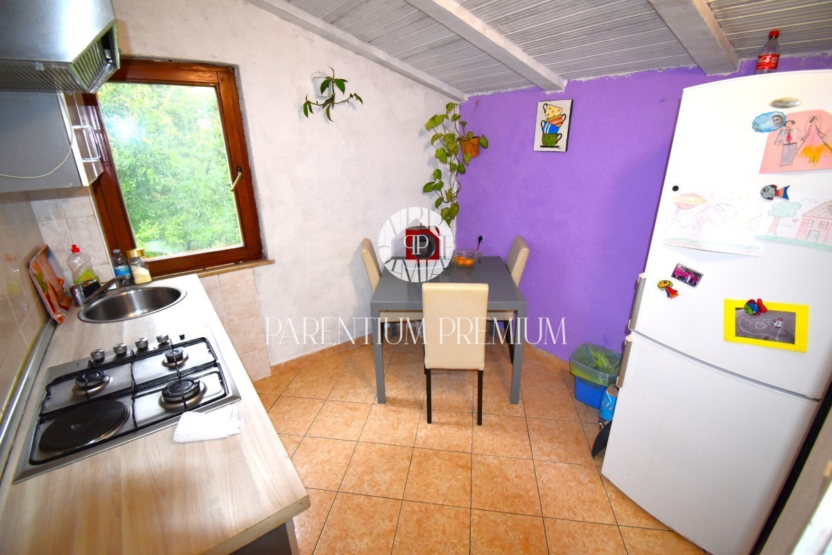 Casa con 2 unità abitative in posizione tranquilla