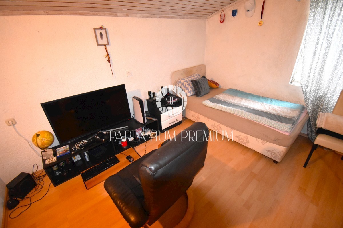 Casa con 2 unità abitative in posizione tranquilla