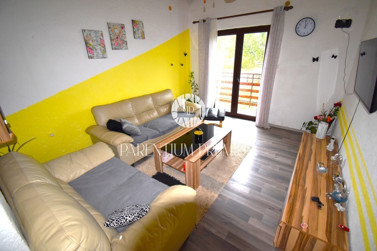 Casa con 2 unità abitative in posizione tranquilla