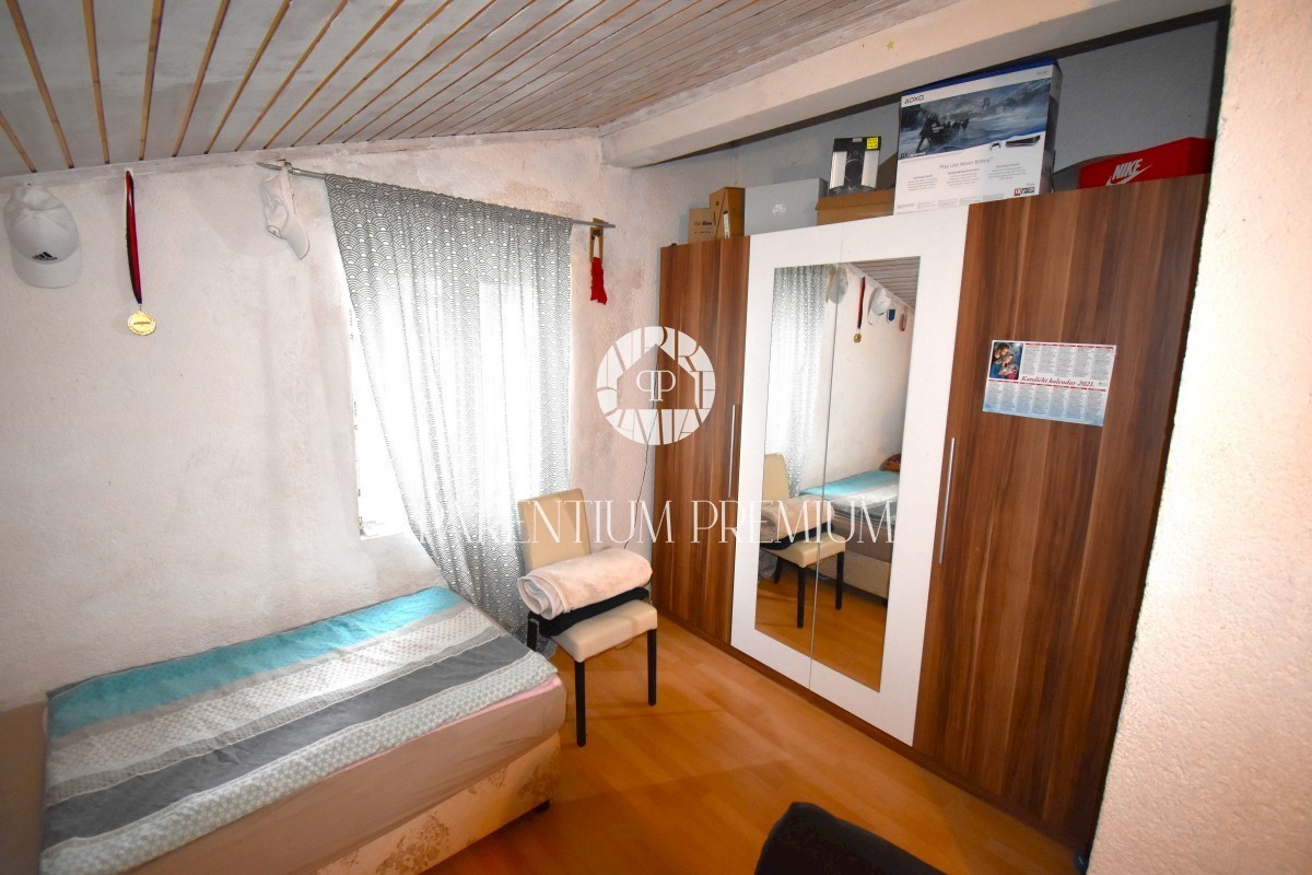 Casa con 2 unità abitative in posizione tranquilla