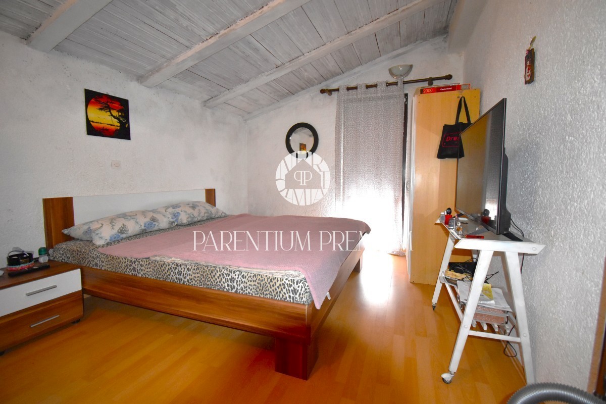 Casa con 2 unità abitative in posizione tranquilla