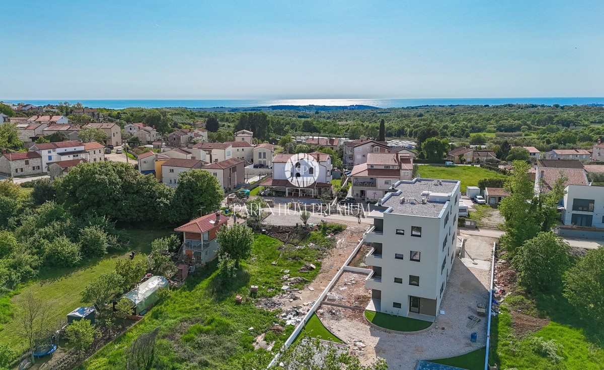 Appartamento con terrazza e 2 camere da letto in un edificio moderno con ascensore