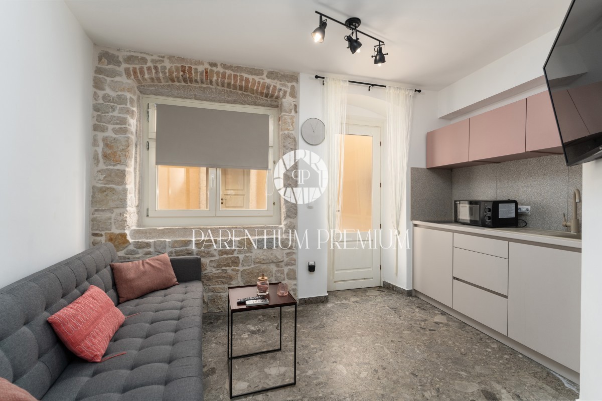 Casa in pietra ristrutturata con 3 appartamenti nel centro