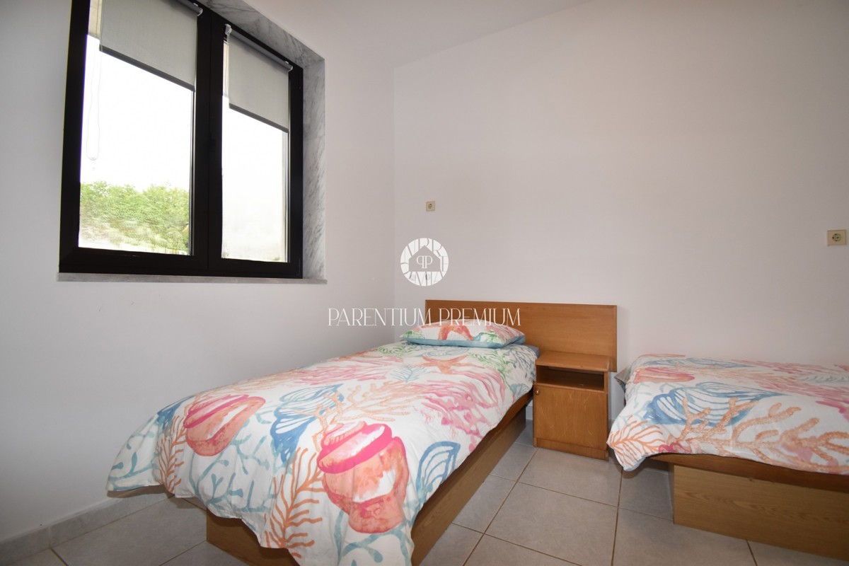 Funtana - Appartamento al piano terra con giardino e due camere da letto