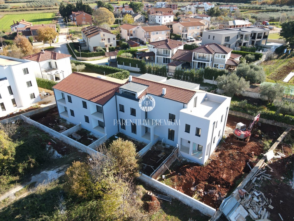 Appartamento su due livelli con due camere da letto e giardino