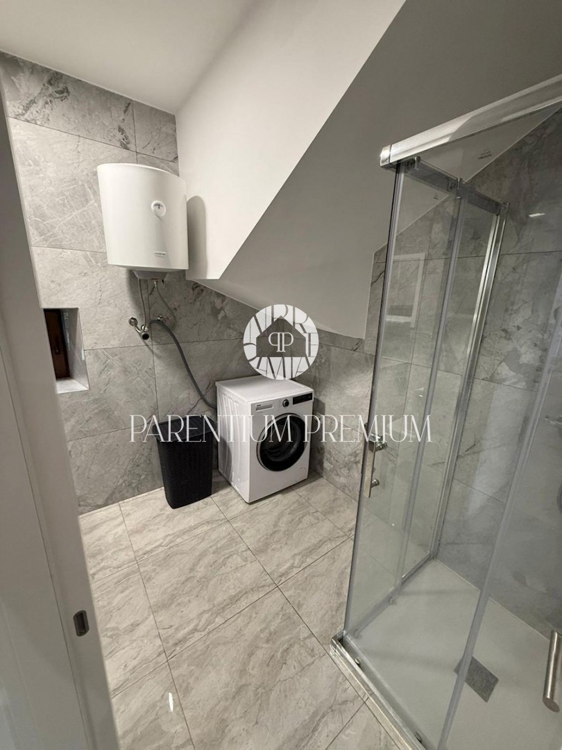 Affascinante casa in pietra a schiera con vista mare