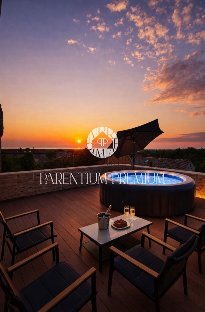 Affascinante casa in pietra a schiera con vista mare