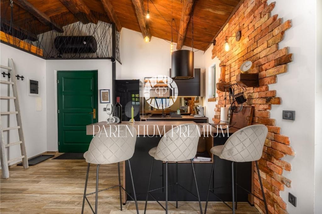 Affascinante casa in pietra su un unico livello con garage – un’oasi di pace e privacy