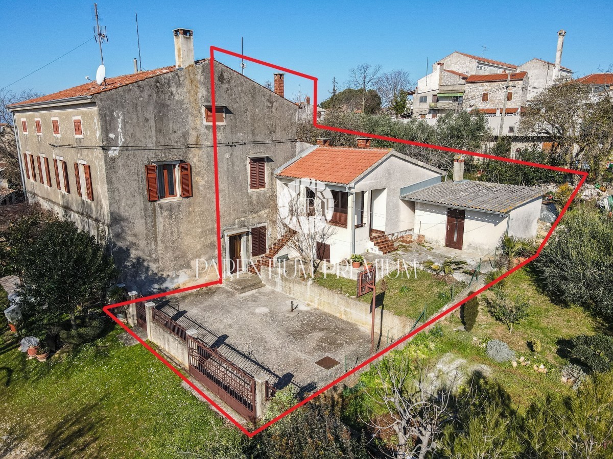 Casa a schiera con due unità abitative