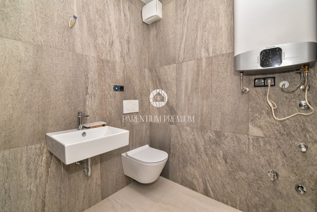 Appartamento esclusivo in centro – 2° piano, ascensore e posto auto in garage