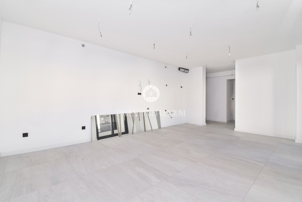 Appartamento esclusivo in centro – 2° piano, ascensore e posto auto in garage