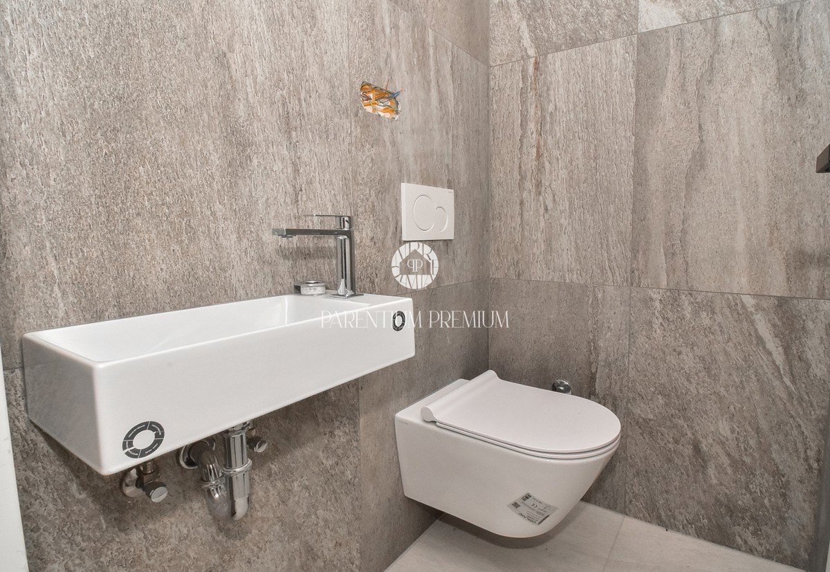 Appartamento esclusivo in centro – 2° piano, ascensore e posto auto in garage