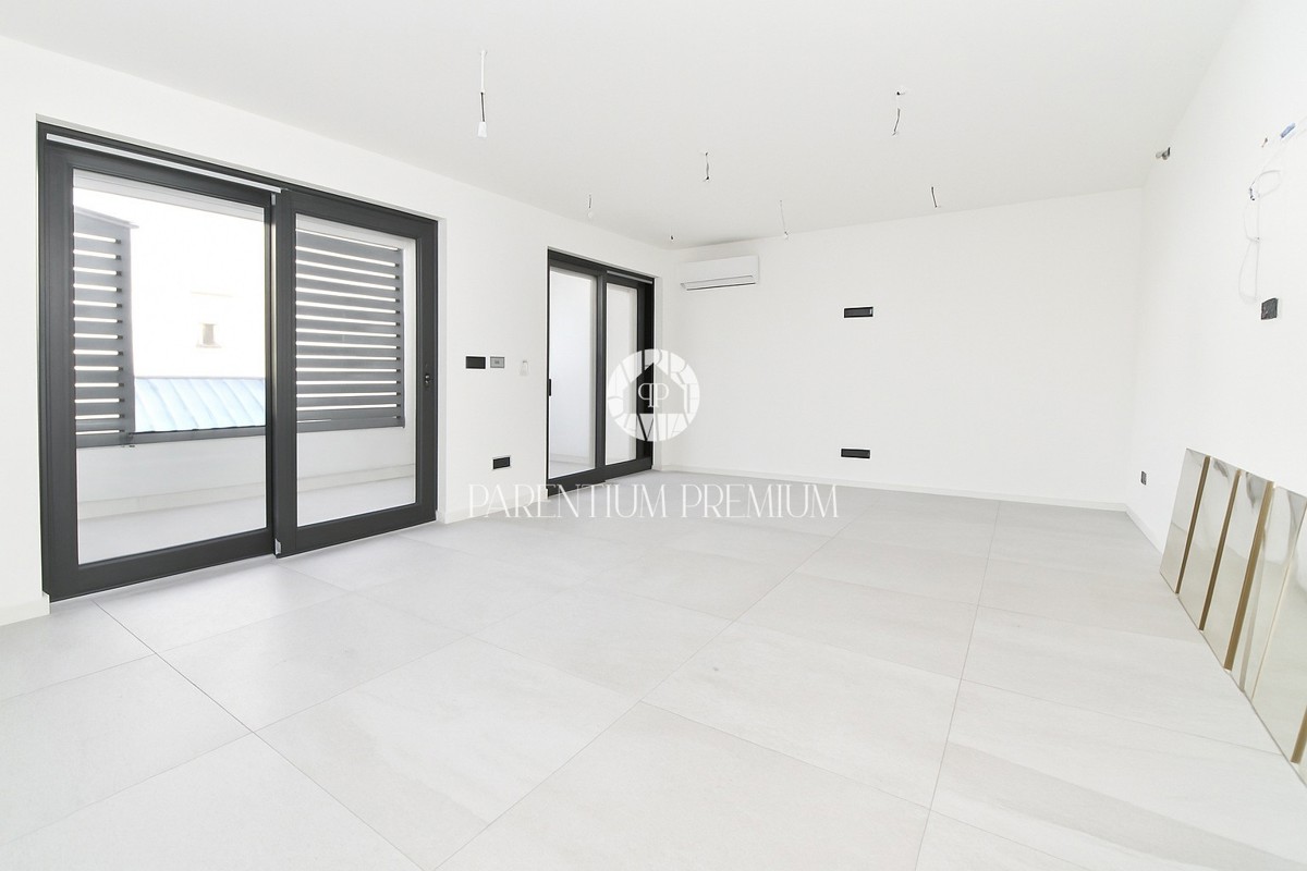 Appartamento esclusivo in centro – 2° piano, ascensore e posto auto in garage