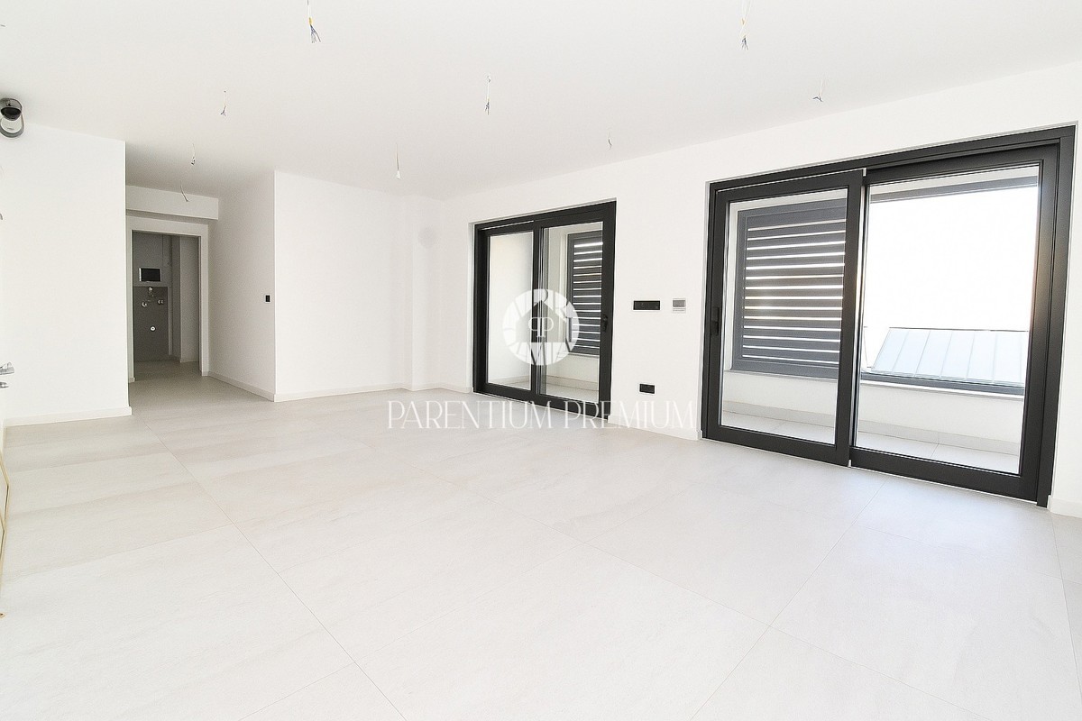 Appartamento esclusivo in centro – 2° piano, ascensore e posto auto in garage