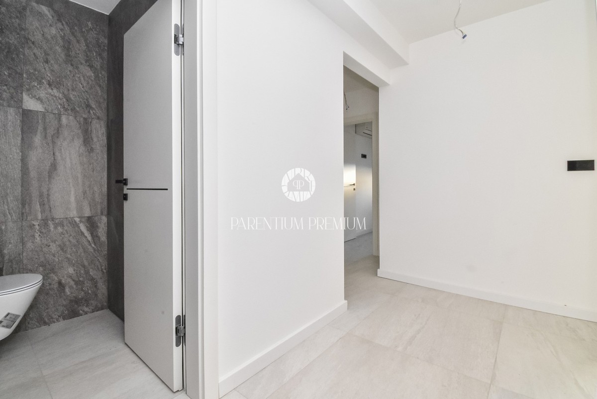 Appartamento esclusivo in centro – 2° piano, ascensore e posto auto in garage