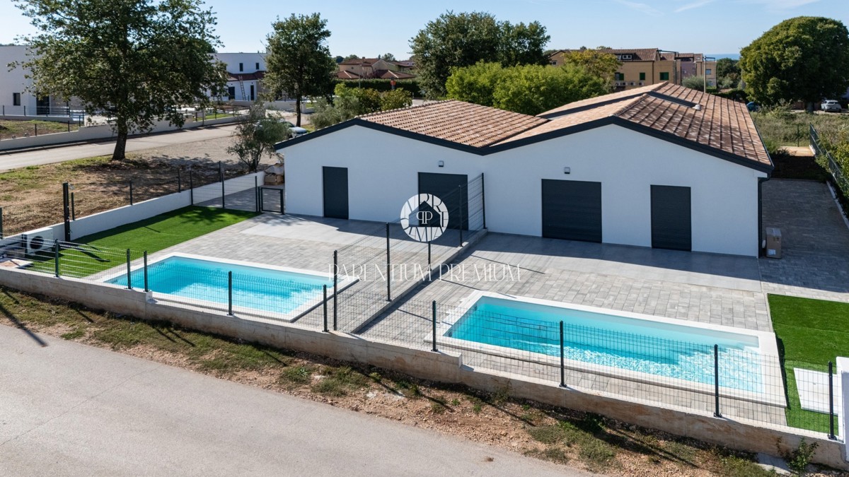 Nuova costruzione – Casa al piano terra con piscina e giardino