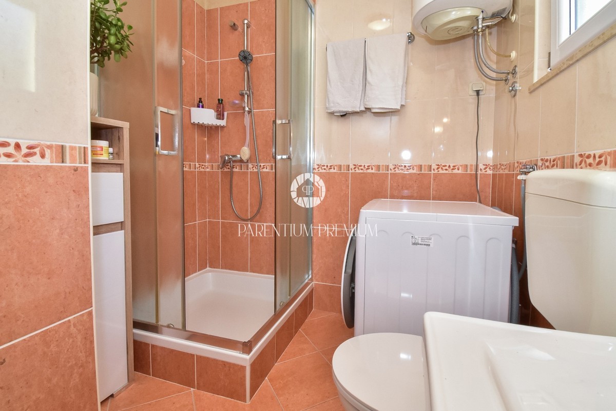 Casa con due appartamenti e un bel curato cortile