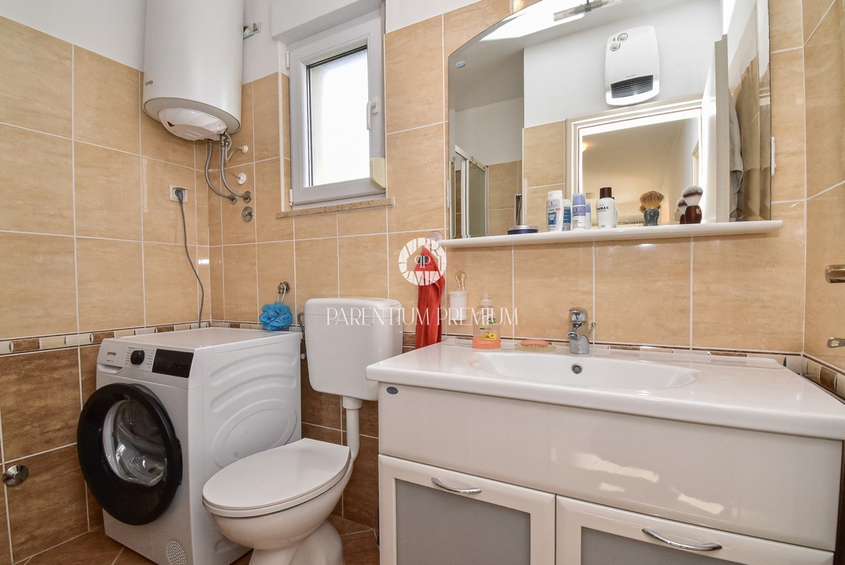 Casa con due appartamenti e un bel curato cortile