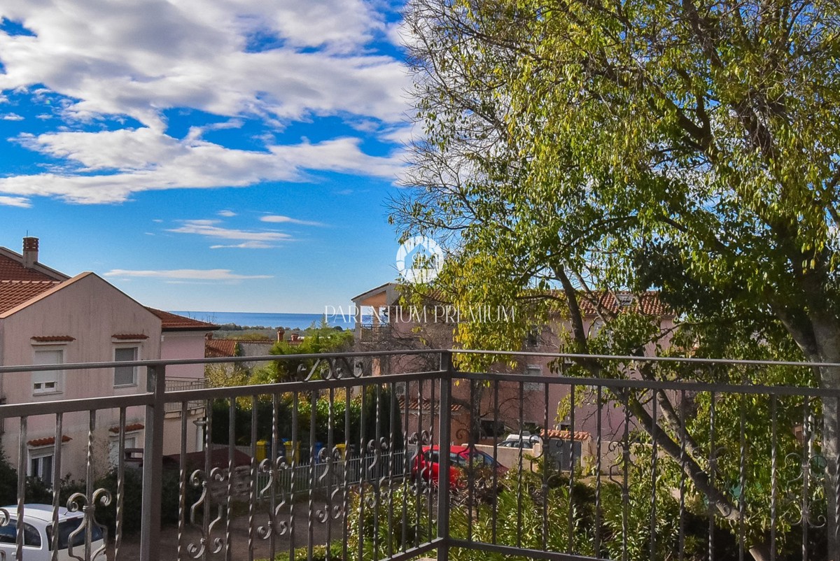 Casa con due appartamenti e un bel curato cortile