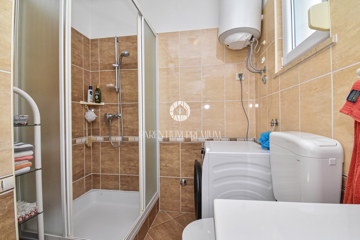 Casa con due appartamenti e un bel curato cortile