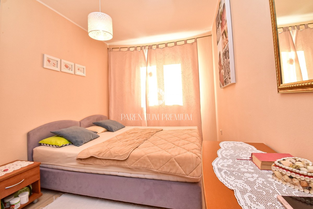 Casa con due appartamenti e un bel curato cortile