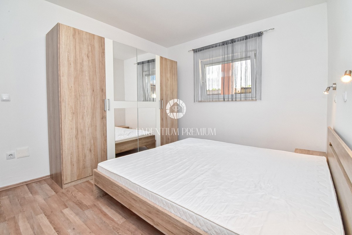 Ampia casa con due appartamenti, grande giardino e taverna