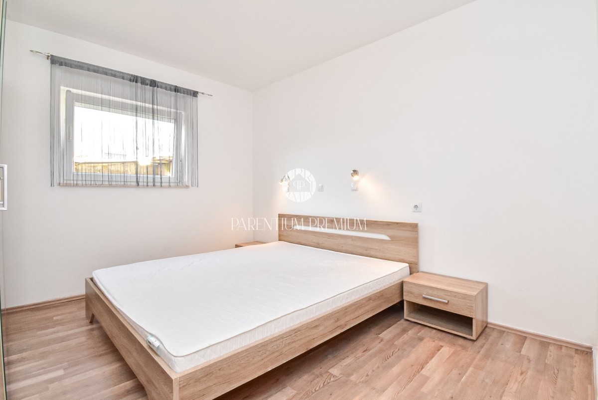 Ampia casa con due appartamenti, grande giardino e taverna