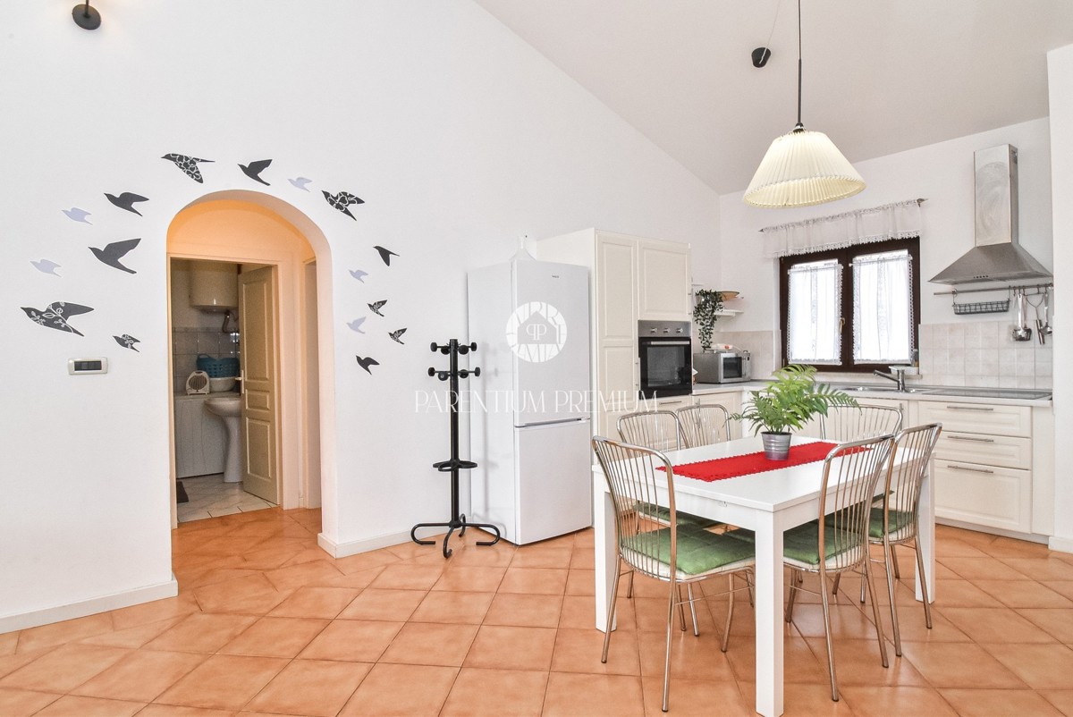 Casa a schiera con splendida vista panoramica sul mare e piscina condominiale