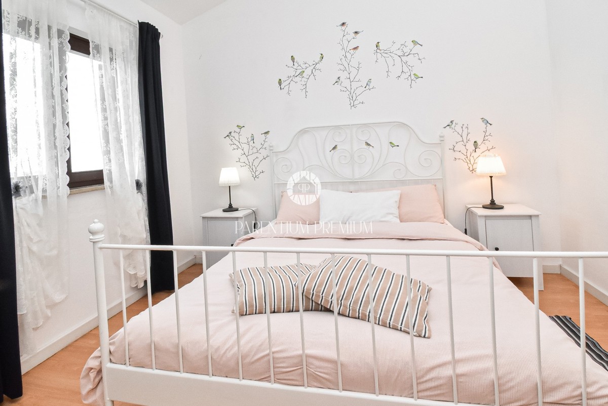 Casa a schiera con splendida vista panoramica sul mare e piscina condominiale