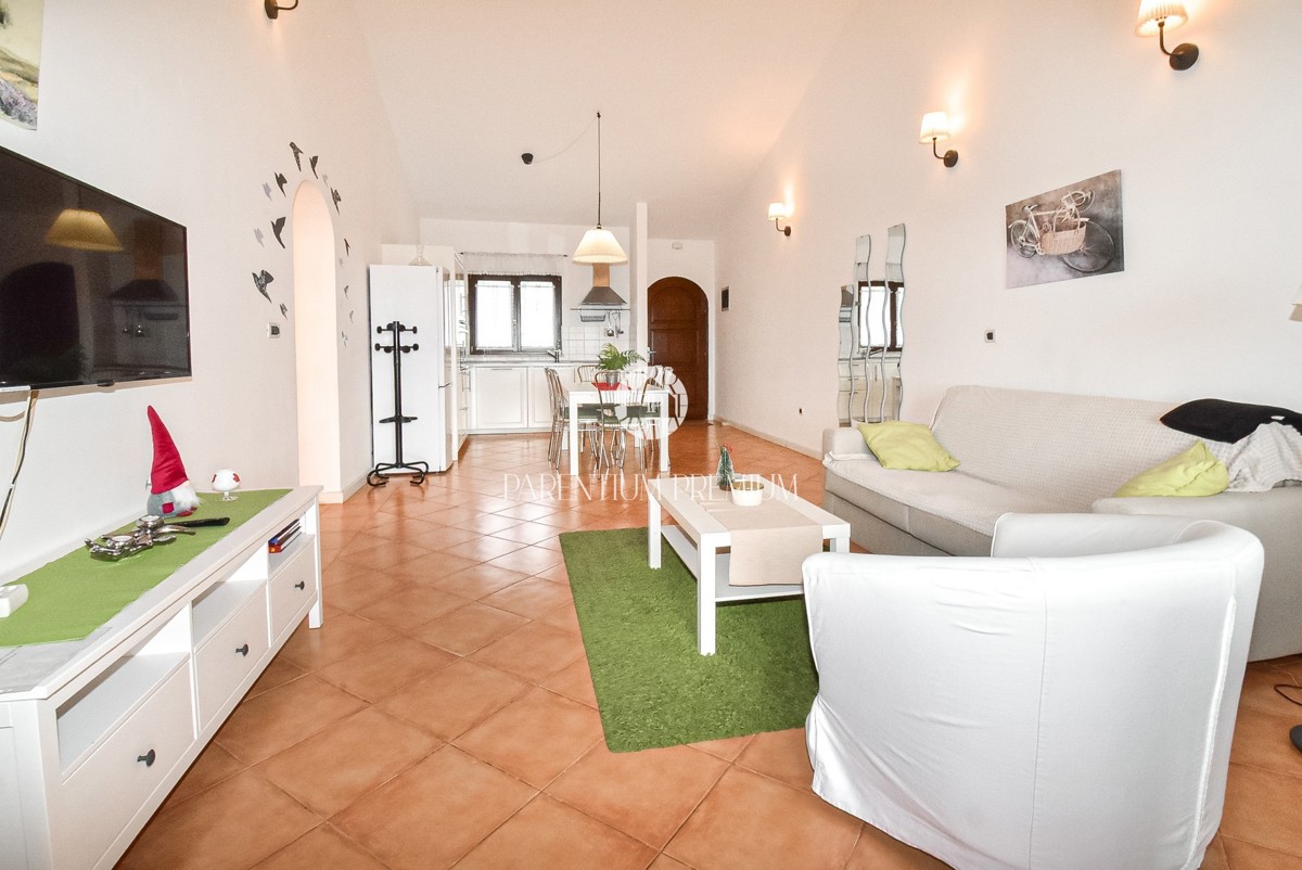 Casa a schiera con splendida vista panoramica sul mare e piscina condominiale