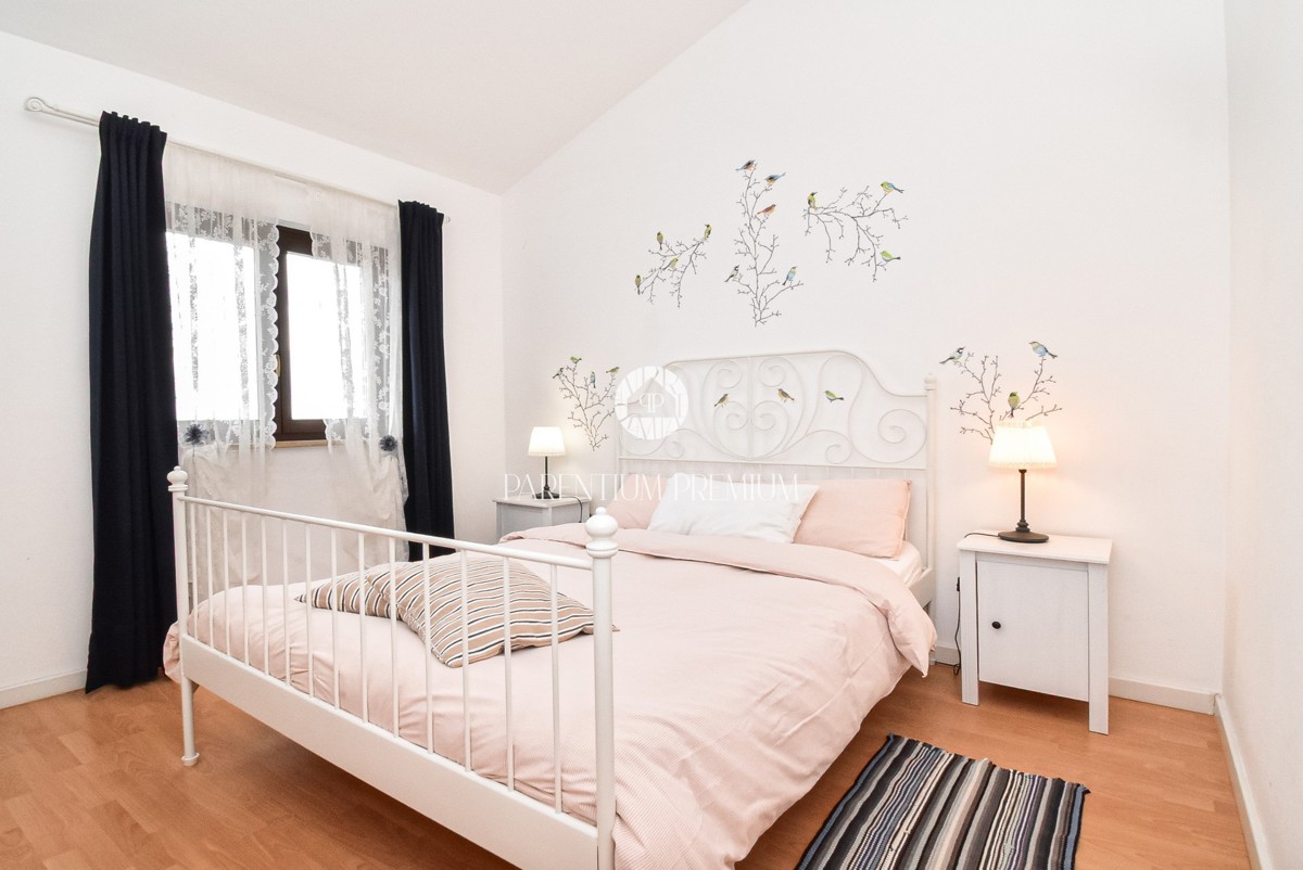 Casa a schiera con splendida vista panoramica sul mare e piscina condominiale