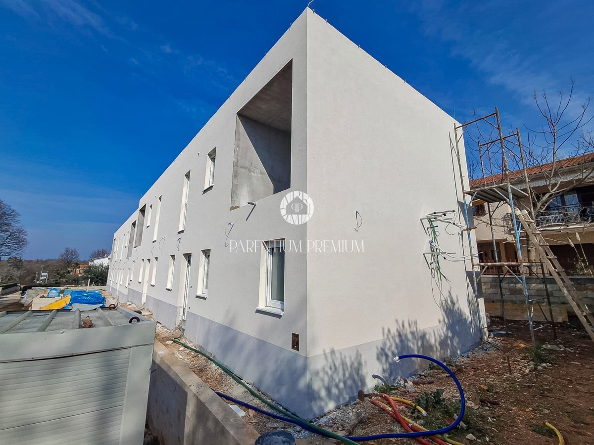 Casa a schiera in posizione eccellente con cortile e vista mare