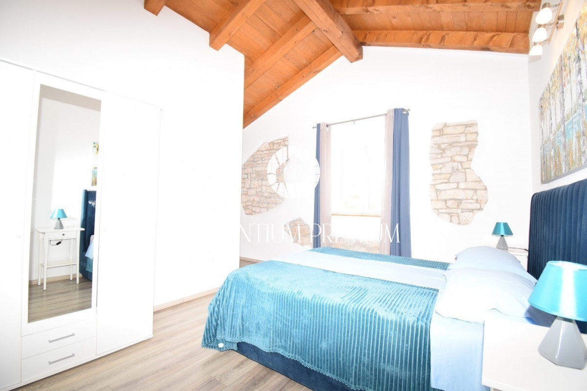 Casa in pietra ristrutturata con molto terreno