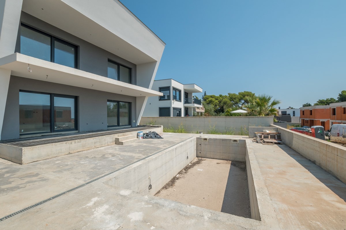 Medolino, casa moderna con piscina e vista mare