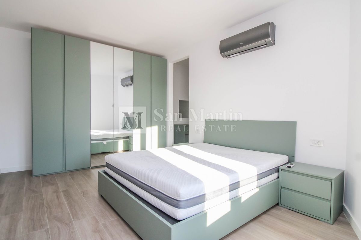 Parenzo, moderno appartamento al piano terra con giardino.