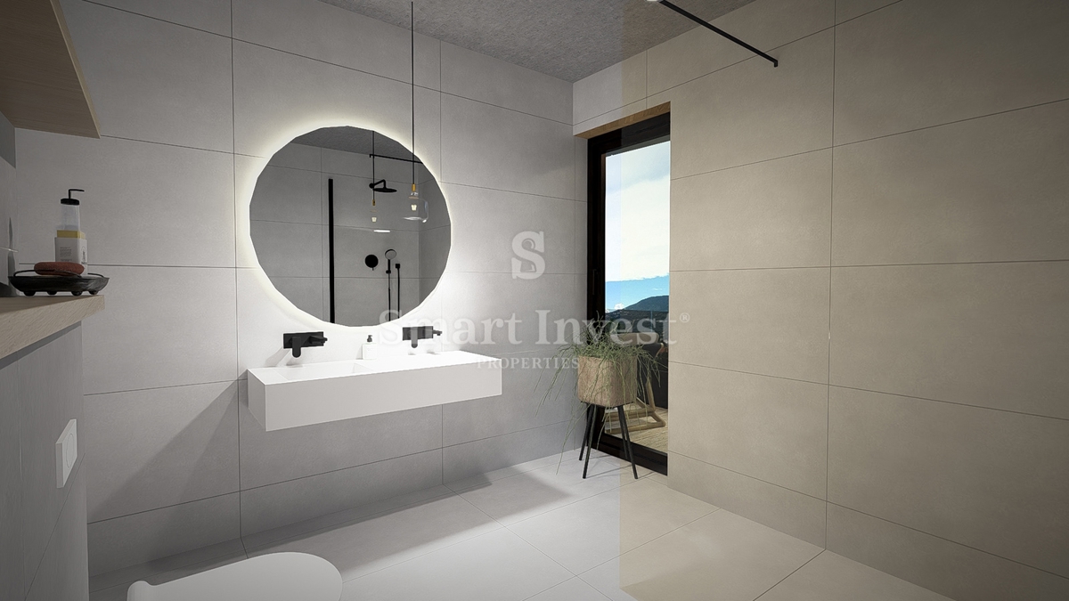 IČIĆI, appartamento trilocale con giardino e vista mare in un nuovo edificio con garage