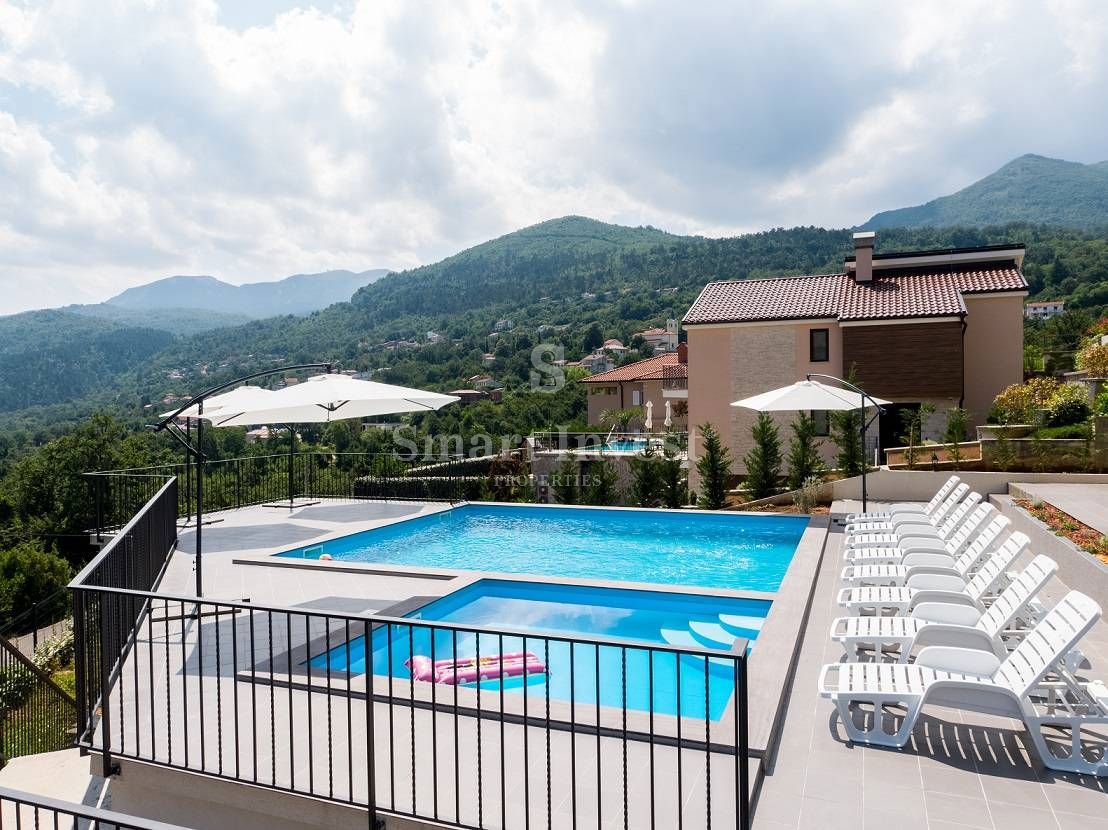 IČIĆI, 4-bedrooms apartment in new building with pool and sea view