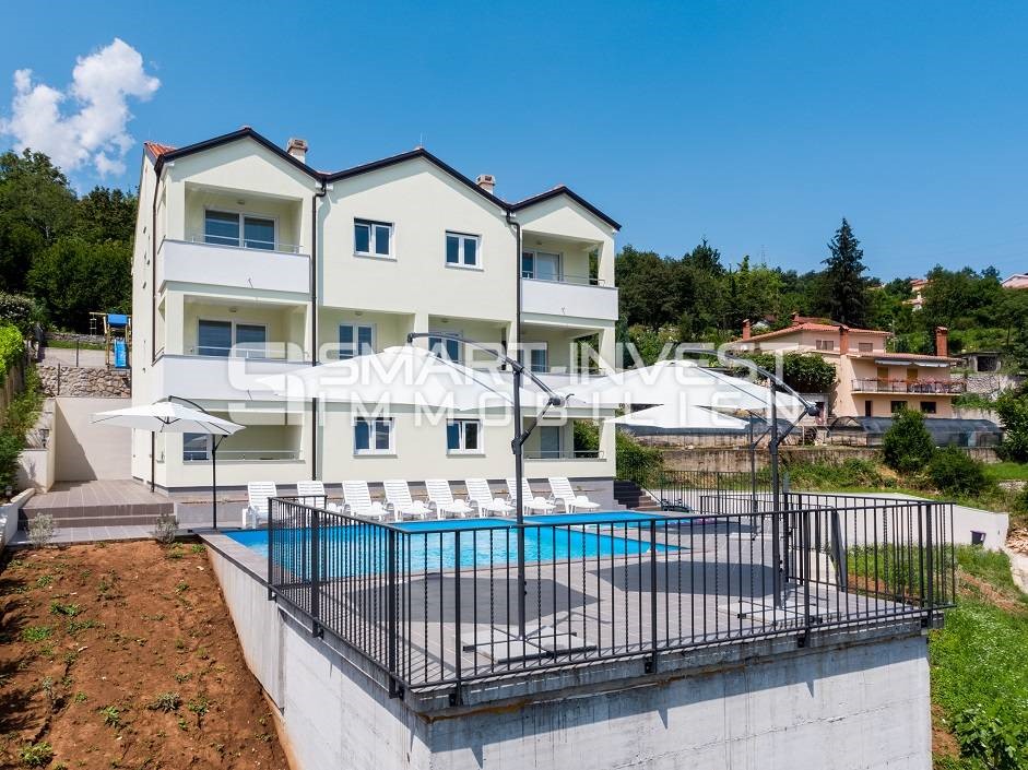 IČIĆI, 4-bedrooms apartment in new building with pool and sea view