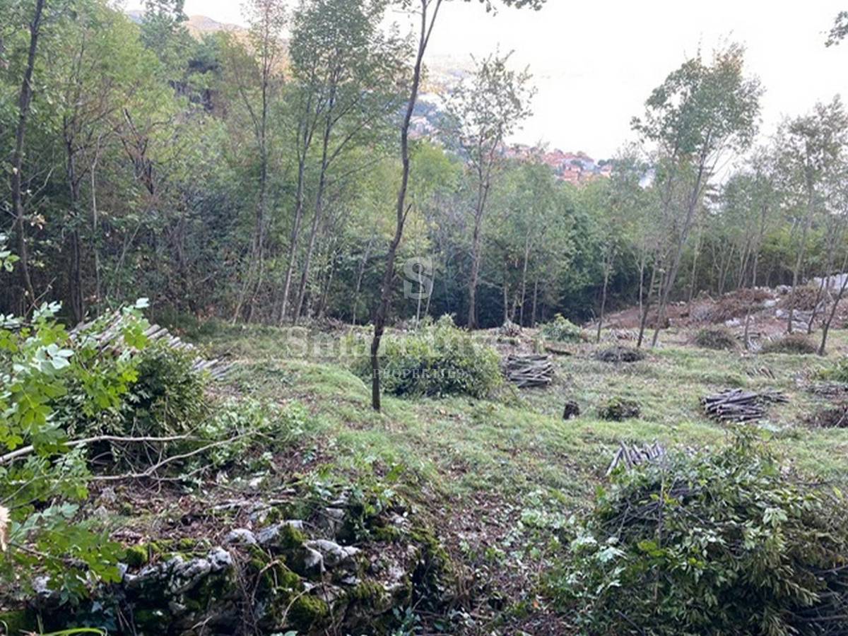 LOVRAN, terreno edificabile di 3055 m2 con vista mare