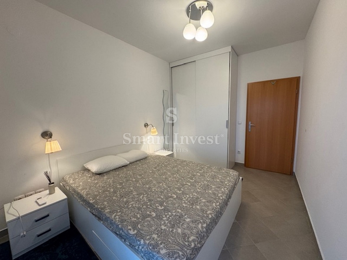 ABBAZIA, appartamento bilocale con parcheggio in edificio con piscina