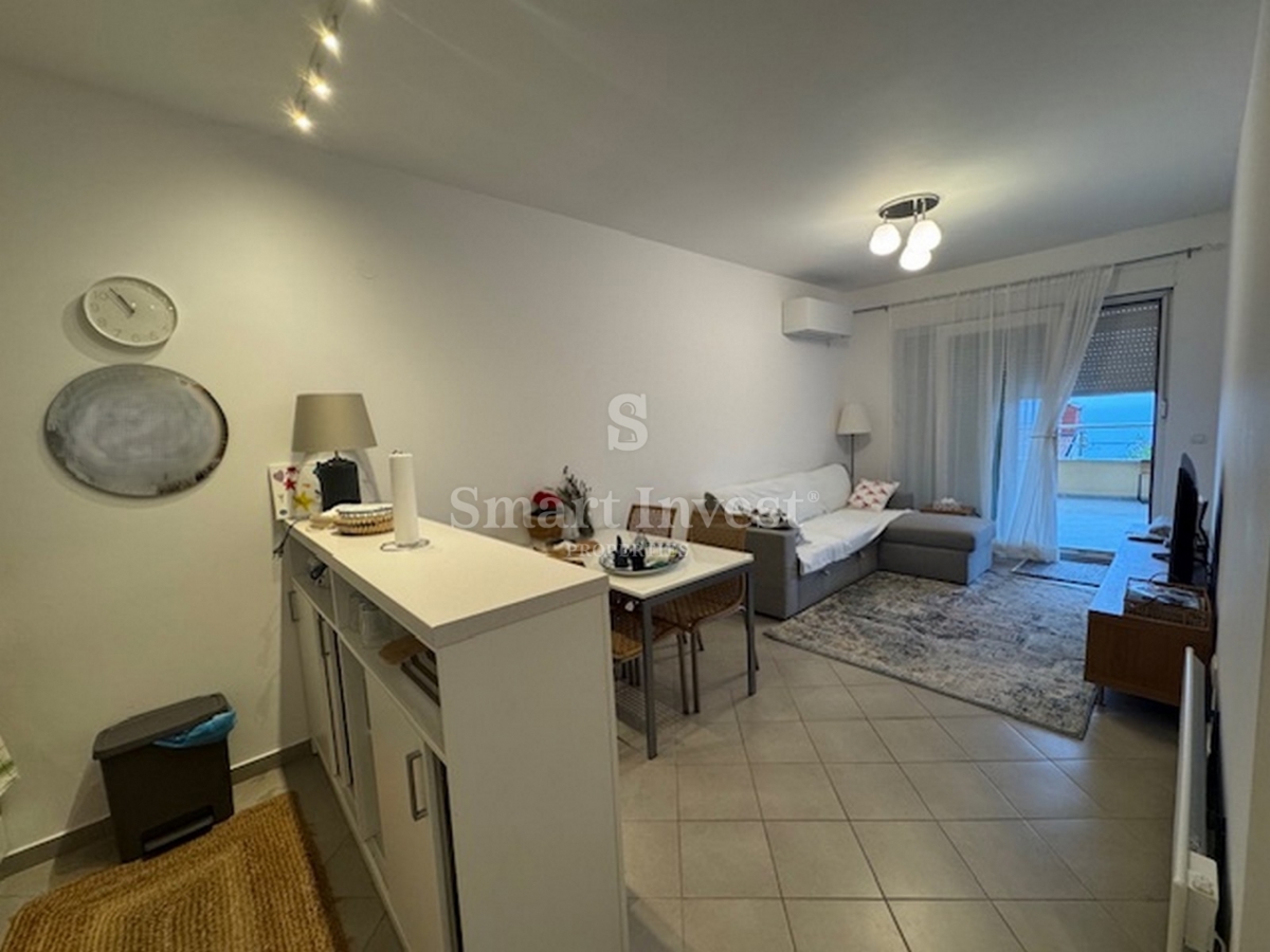 ABBAZIA, appartamento bilocale con parcheggio in edificio con piscina