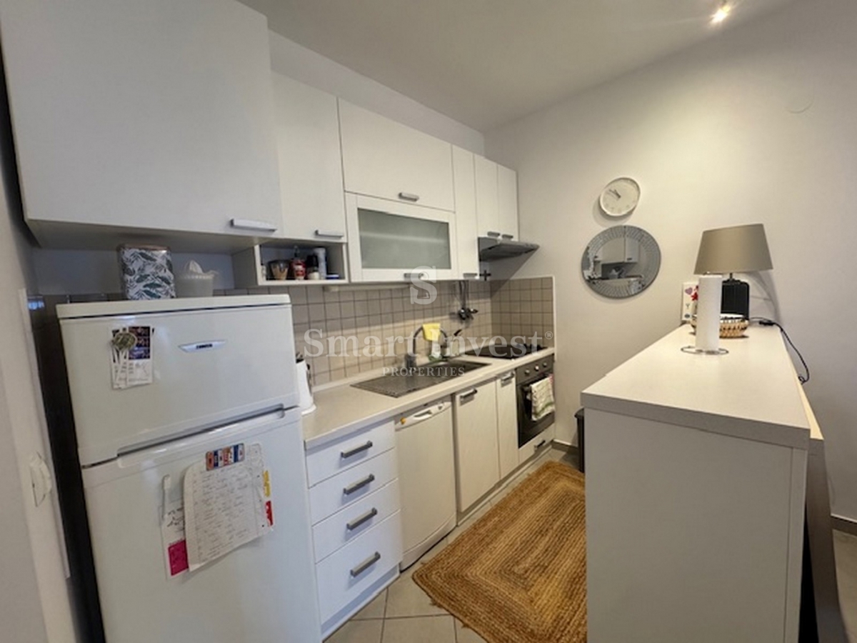 ABBAZIA, appartamento bilocale con parcheggio in edificio con piscina