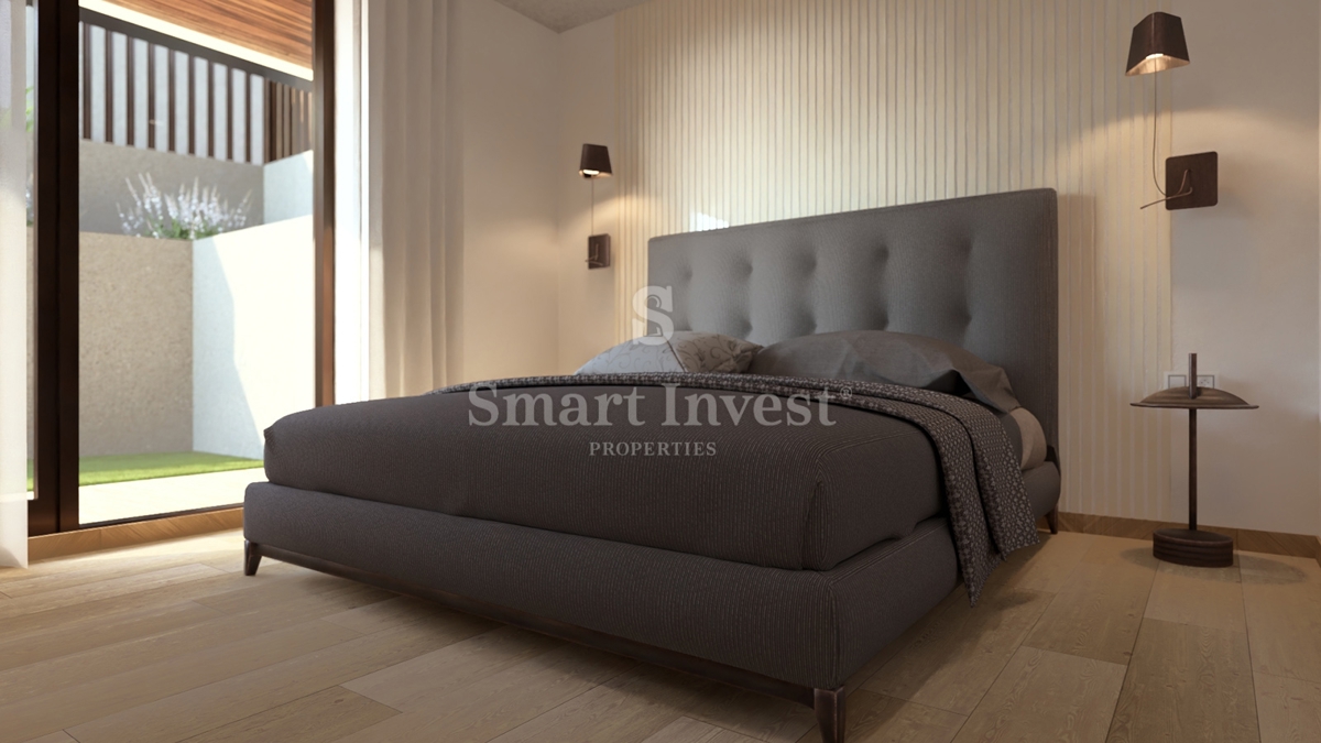 IČIĆI, appartamento trilocale con giardino e vista mare in un nuovo edificio con garage